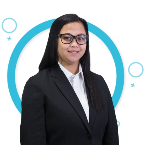 Charisse Castillo, Trainee Practice Manager at M Physio, dressed professionally with a black blazer, standing in front of a white background with blue graphic circles.