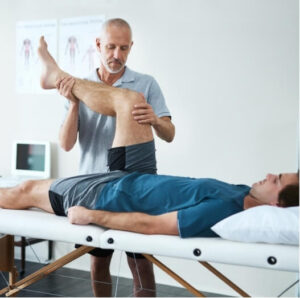 Physiotherapist examining a patient’s knee to assess swelling caused by a Baker’s cyst