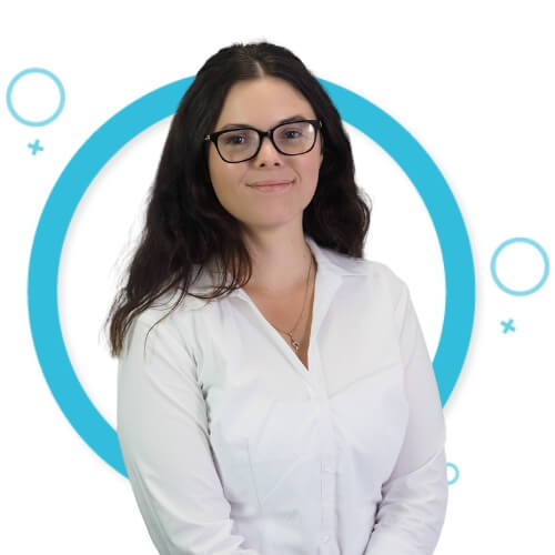 Rebecca Lay standing in front of a blue circle background