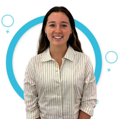 Portrait photo of Summah Joyce standing in front a background with a blue circle.