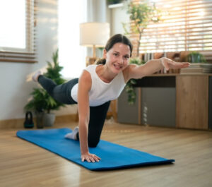 Woman performing balance exercise during load tolerance physiotherapy program