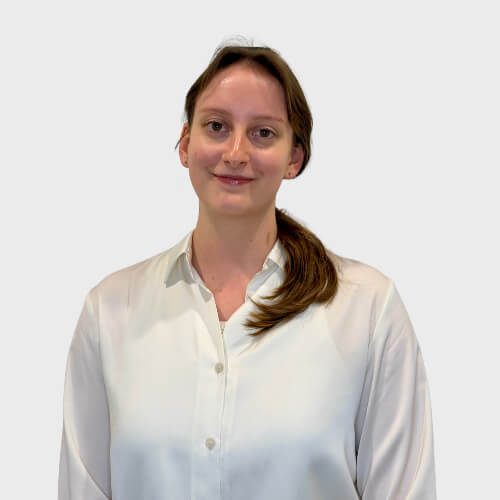 Alison Glaister Portrait in front of grey background