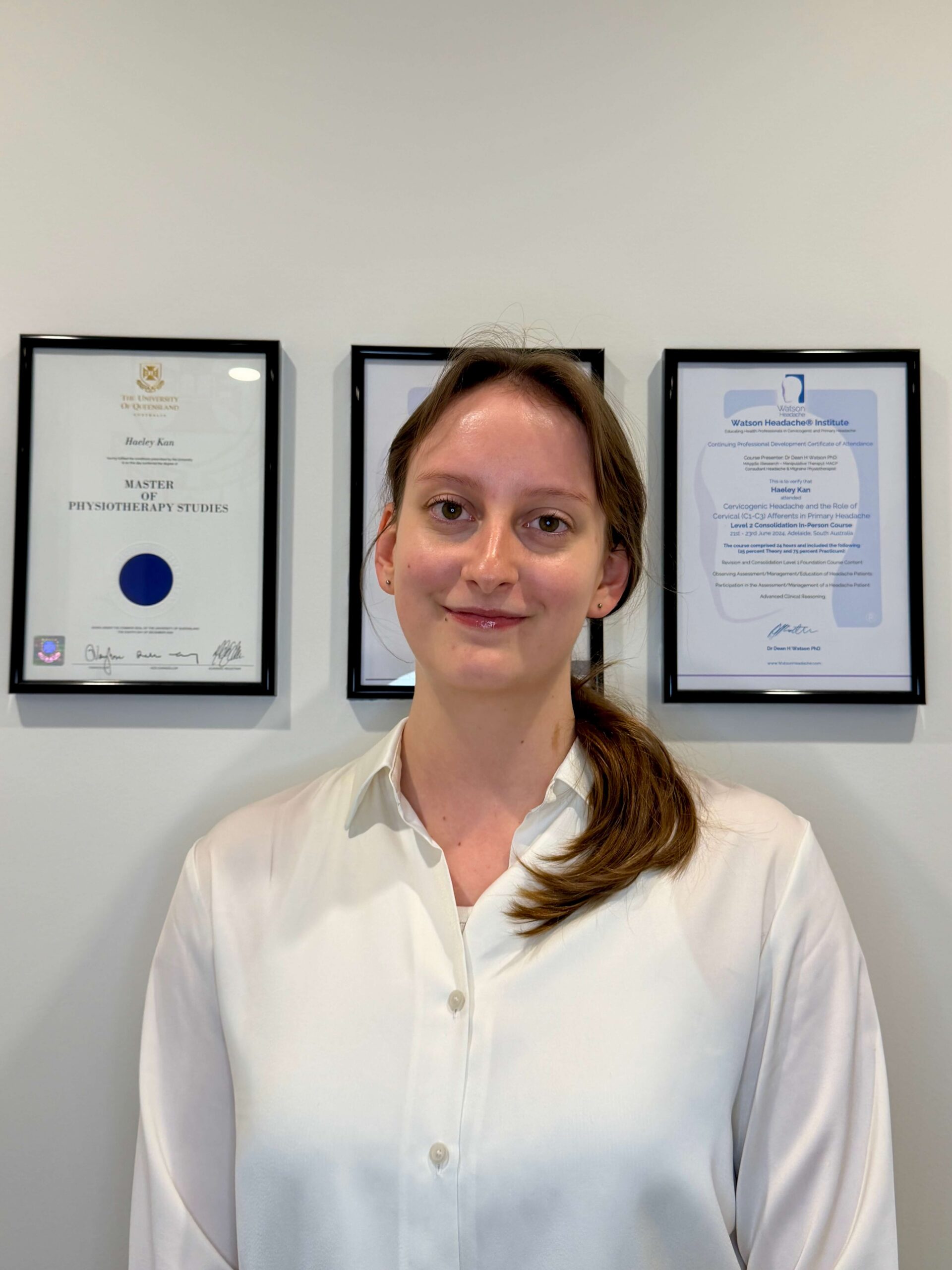 Alison Glaister Portrait in front of frames